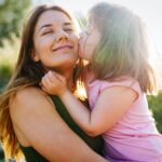 Little girl with special needs enjoy spending time with mother